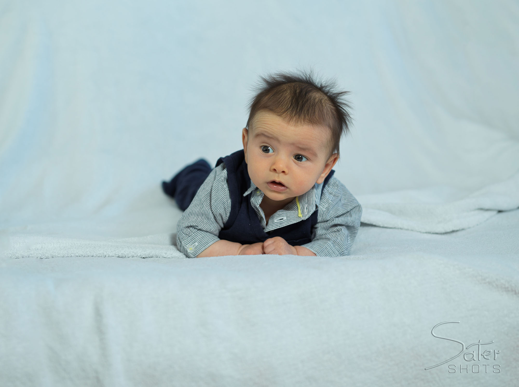 Surprised baby looking up